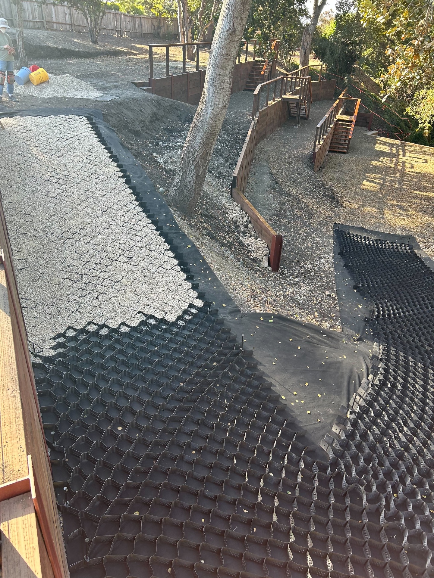 Residential slope stabilized with BaseCore geocell and gravel infill