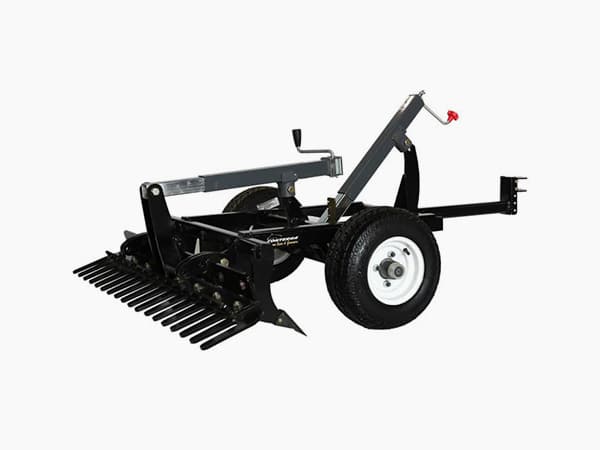 Conterra Arena Rake pulled behind a compact tractor — main product view