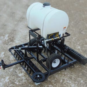 A black and white tractor with a water tank on it, equipped with Water Kits EG.