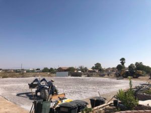 A construction crew is working on an arena.