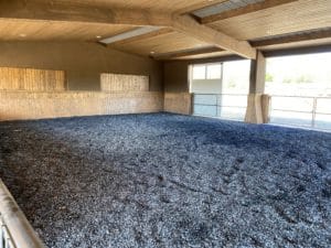 An arena with a lot of gravel in it.