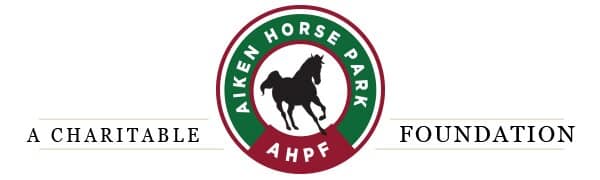 The logo for Aken Horse Park, a charitable AFP foundation, incorporates elements representing the equestrian world and horse arena footing. The logo for Aken Horse Park, a charitable AFP foundation, incorporates elements representing the equestrian world and horse arena footing.