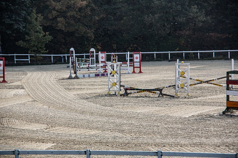 Choosing the Right Outdoor Riding Arena Footing - Featured Image