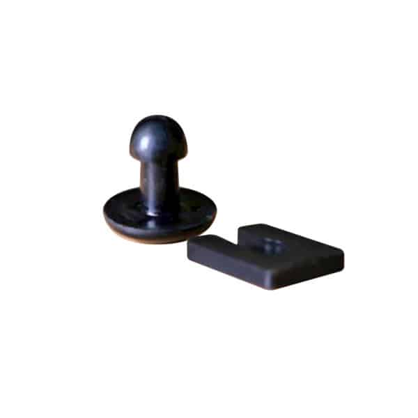 A black plastic piece with a small hole in it, included in the BaseClips (Pack of 45) pack.