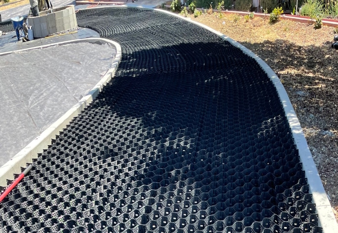 A black grid on a road.